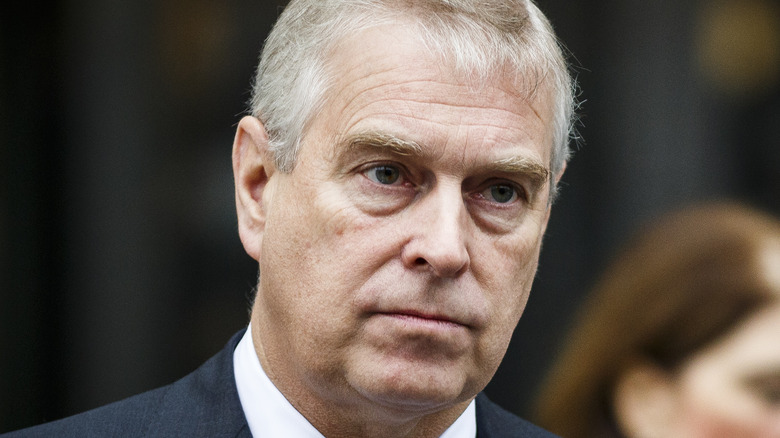 Prince Andrew frowning