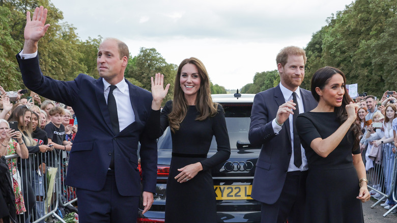 the fab four waving 