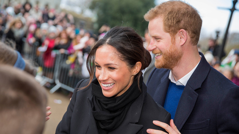 Prince Harry, Meghan Markle greeting people