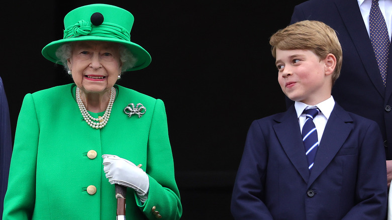 Prince George smiling at Queen Elizabeth 