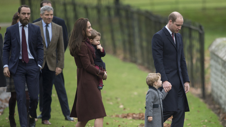 Michael Middleton walking behind Princess Catherine and Prince William