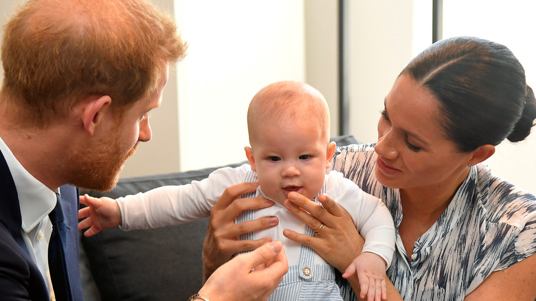 Prince Harry with Meghan, Archie 