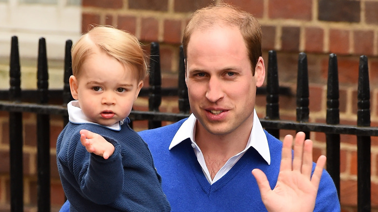 Prince William and Prince George waving to the cameras