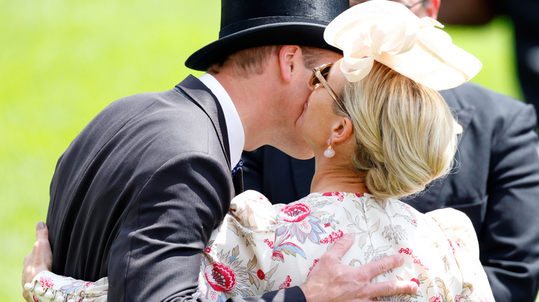 Prince William and Zara Tindall embracing