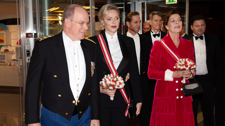 Albert, Charlene, and Caroline walking