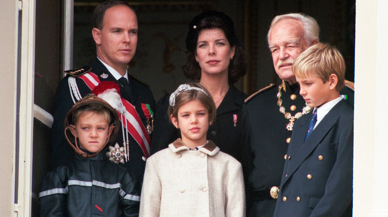 The Monaco royals posing on the palace balcony 