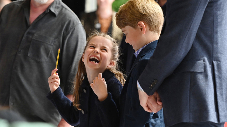 Princess Charlotte laughing with her brother Prince George