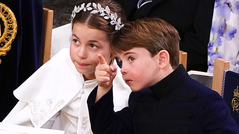 Princess Charlotte looking at what Prince Louis is pointing at