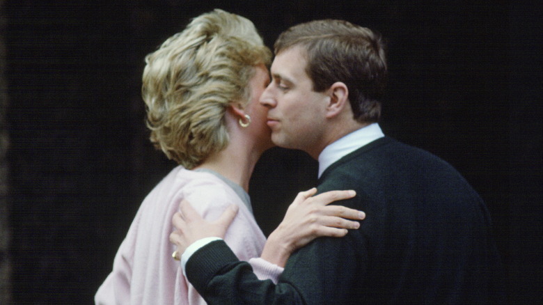 Princess Diana kissing Prince Andrew on the cheek