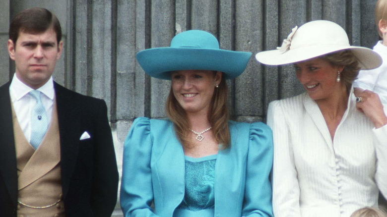 Prince Andrew, Sarah Ferguson, and Princess Diana standing together