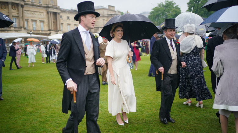 Princess Eugenie holding umbrella 