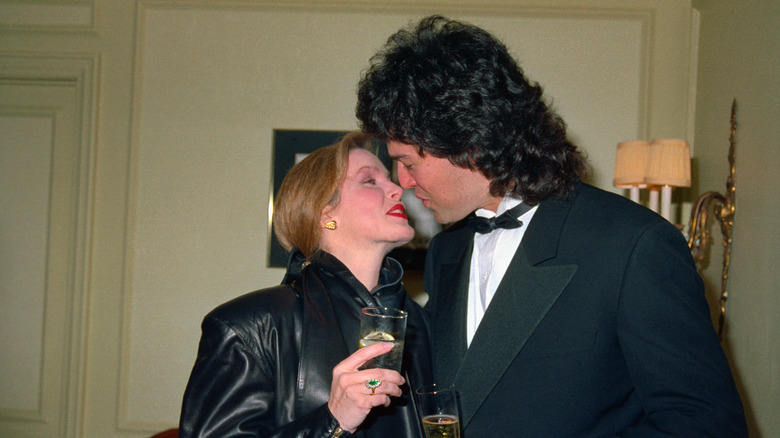 Priscilla Presley kissing Marco Garibaldi