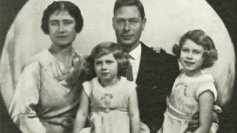 Queen Elizabeth and Princess Margaret with their parents