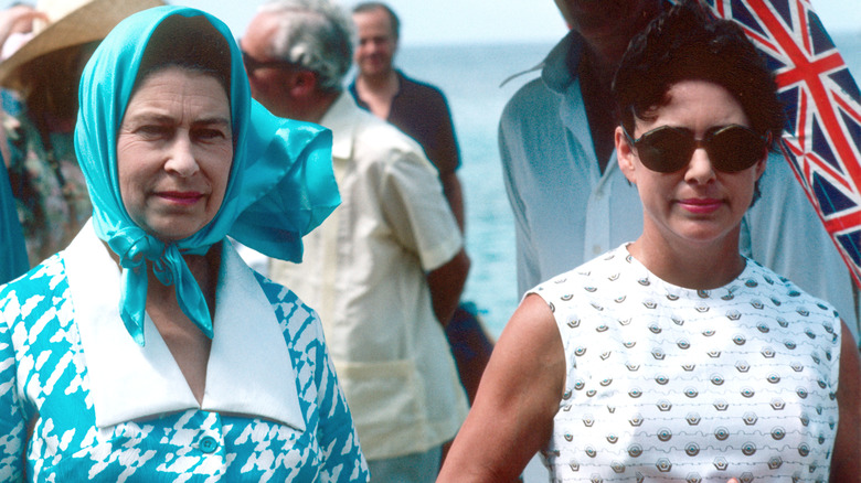 Queen Elizabeth and Princess Margaret standing together