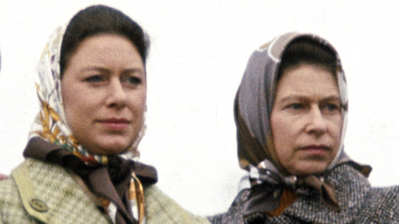 Queen Elizabeth and Princess Margaret standing together