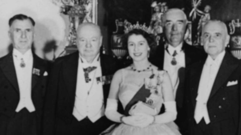 Queen Elizabeth and Winston Churchill at an event