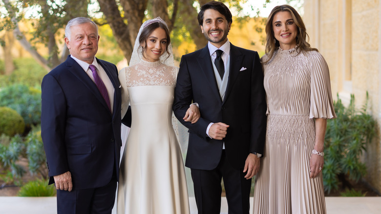 King Abdullah II ibn Al Hussein of Jordan, Princess Iman Bint Abdullah II, Jameel Alexander Thermiotis and Queen Rania of Jordan pose together