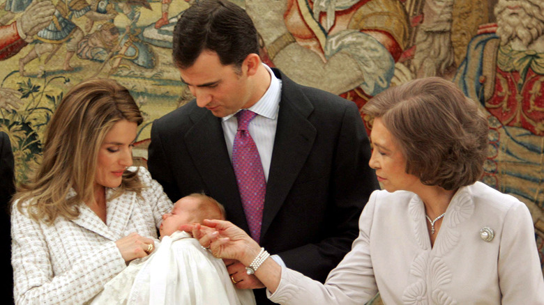 Queen Letizia holding Princess Leonor with King Felipe, Queen Sofia