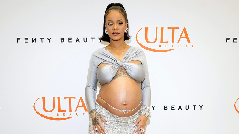 Rihanna posing with baby bump 