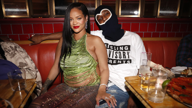 Rihanna, A$AP Rocky with mask sitting