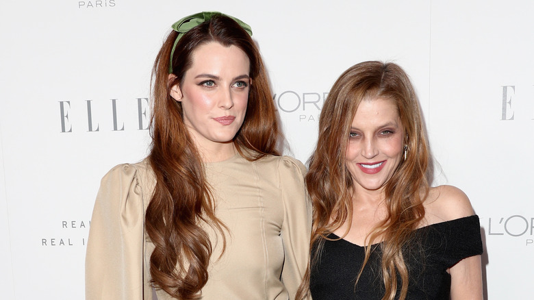 Riley Keough and Lisa Marie Presley posing