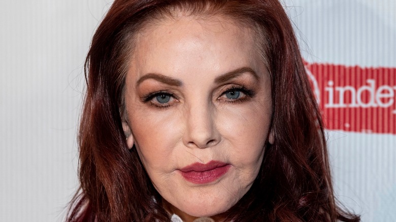 Priscilla Presley looking directly into camera