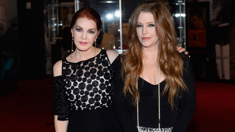 Priscilla and Lisa Marie Presley posing together