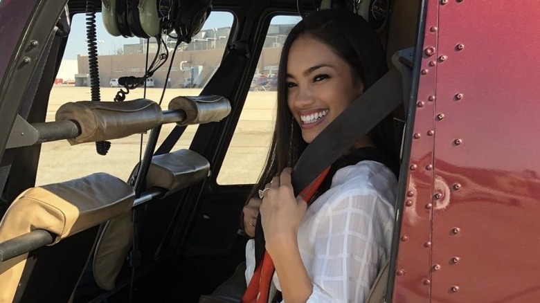 Bryiana Noelle Flores on a helicopter