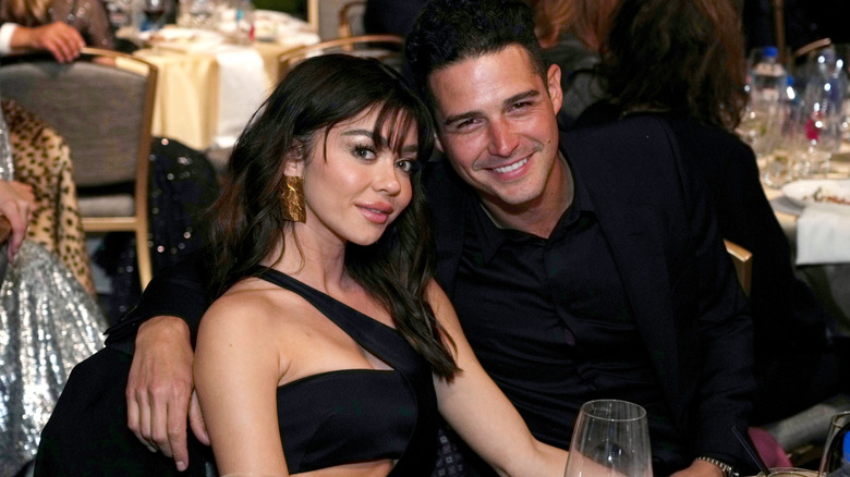 Sarah Hyland and Wells Adams smiling