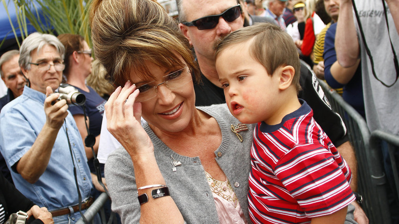 Sarah Palin holding her son Trig