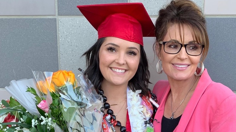 Sarah Palin smiling with her daughter Piper