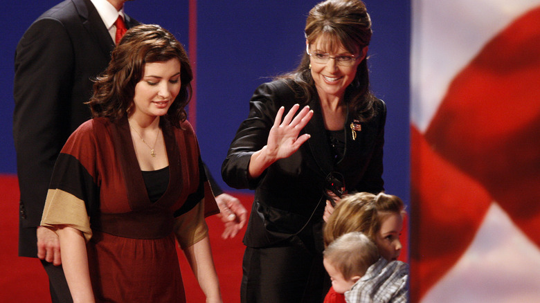 Sarah Palin leaving the stage with her daughter Bristol