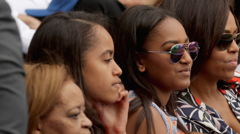 Sasha and Malia at game