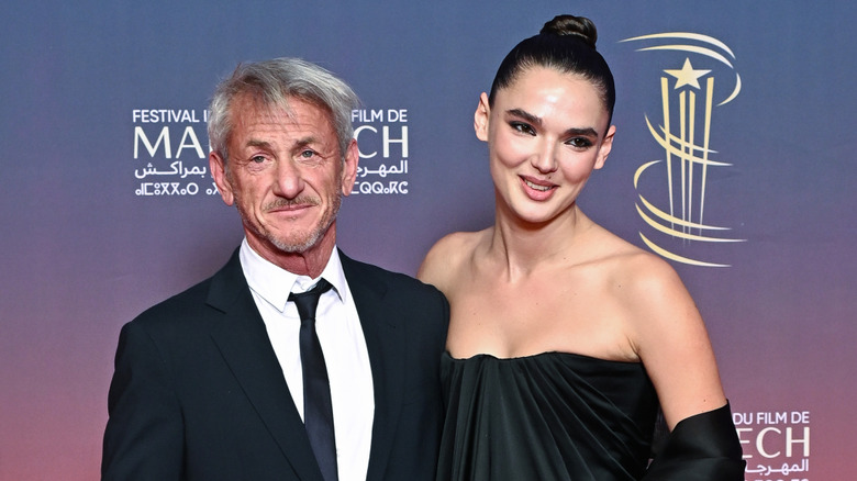 Sean Penn posing with his arm around Valeria Nicov