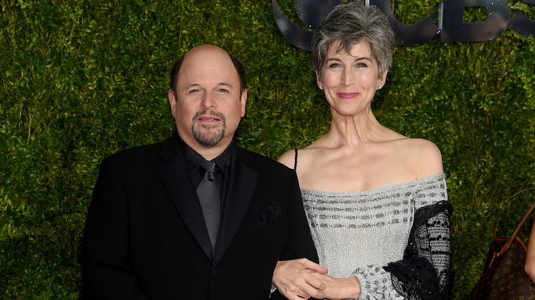 Jason Alexander and wife Daena Title smiling