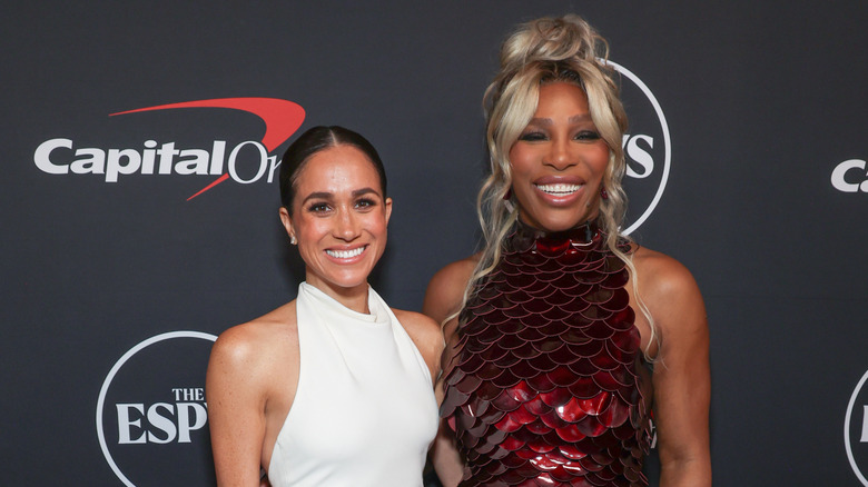 Meghan Markle and Serena Williams smiling