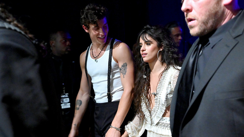 Shawn Mendes, Camila Cabello walking backstage