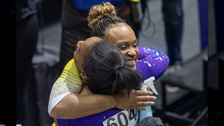 Rebeca Andrade hugs Simone Biles