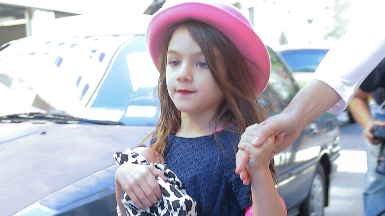 Suri Cruise in lipstick