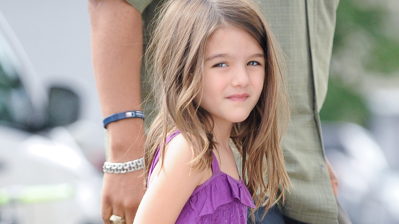 Suri Cruise looking back