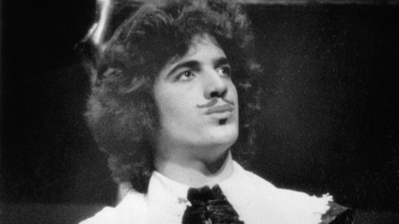 JFK Jr. in a play at Brown, looking up