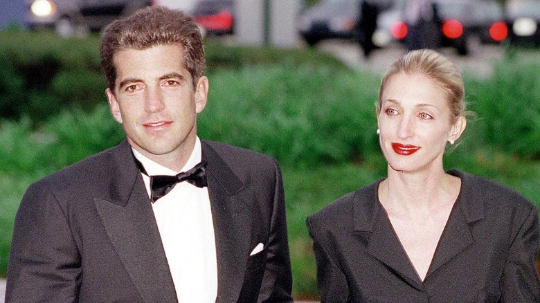 JFK Jr and Carolyn Bessette in formal attire, posing