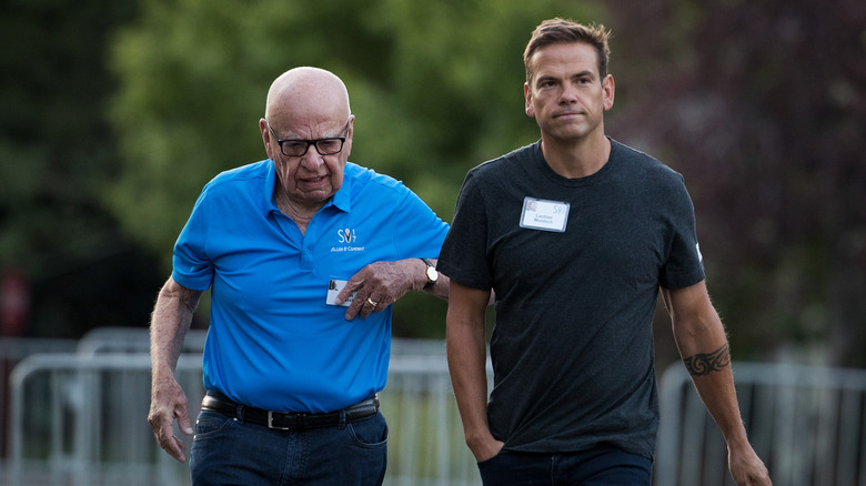 Rupert and Lachlan Murdoch walk together