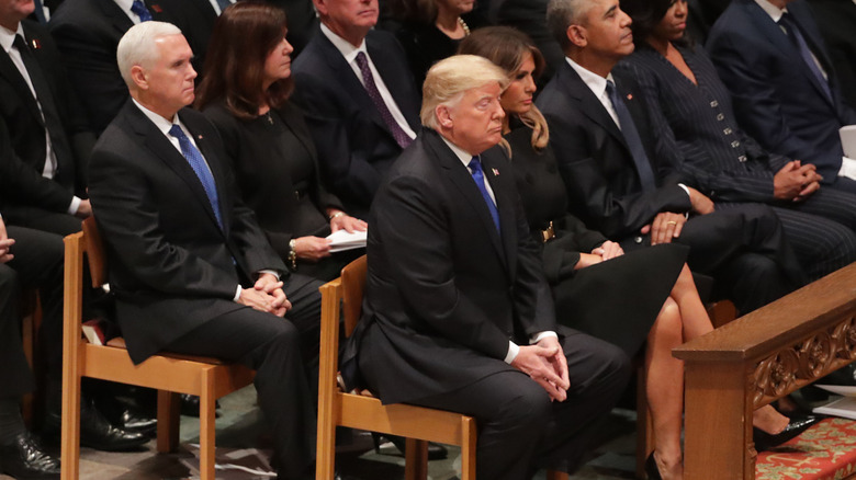 Mike Pence and Donald Trump at Jimmy Carter funeral