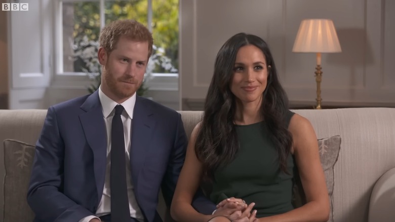 Prince Harry and Meghan Markle sitting together during their BBC interview