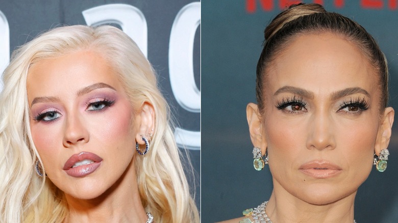 Christina Aguilera and Jennifer Lopez posing.