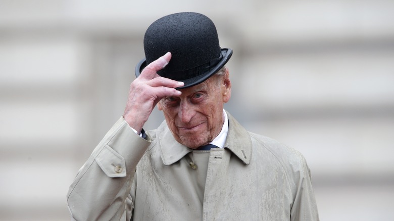 Prince Philip tipping his hat