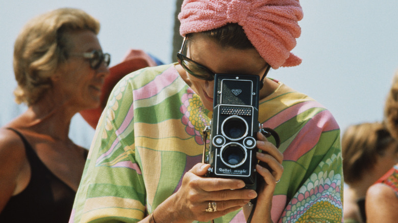 Grace taking a photograph