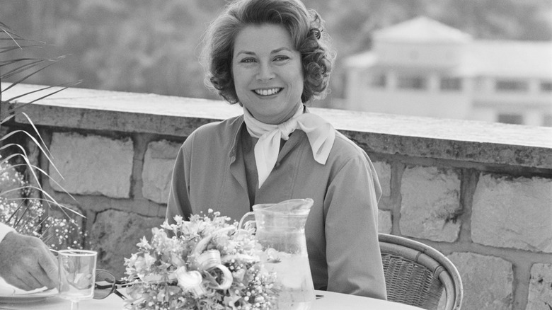 Princess Grace with flower arrangement