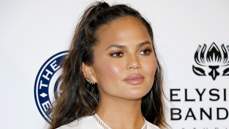 Chrissy Teigen posing at event